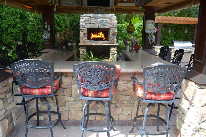 outdoor bar island with fireplace